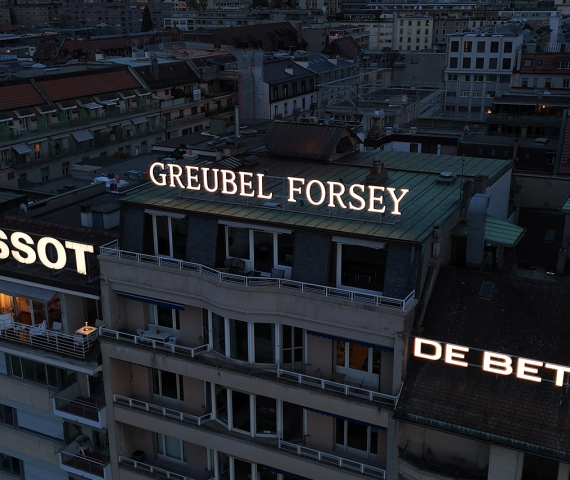 The GREUBEL FORSEY sign <br> in Geneva